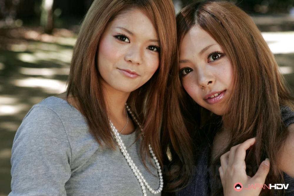Amazing girls Tsubasa and Kanon in shorts enjoy some playful lesbian foreplay outside - #4