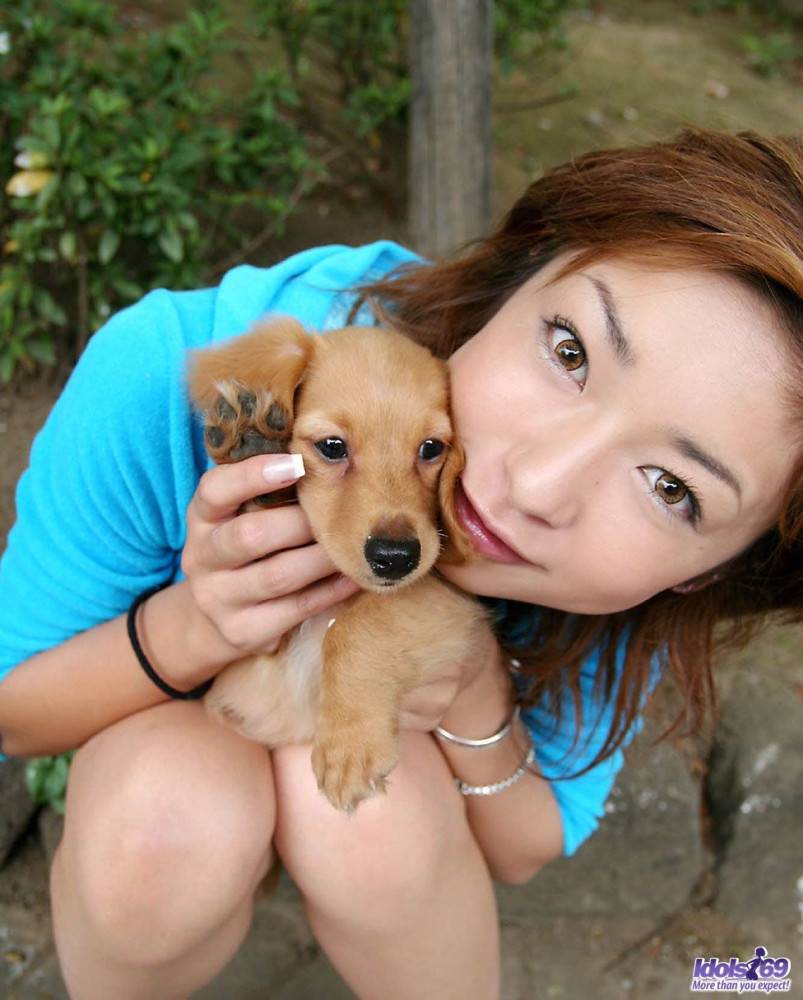 Posing With A Dog Is What One Of The Best Asian Babes Nao Idols Loves To Do. - #1