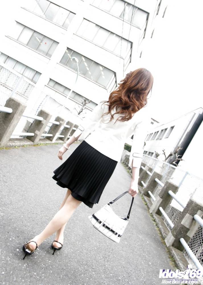 Svelte japanese teen Fumiko in fancy skirt work on rod - #1