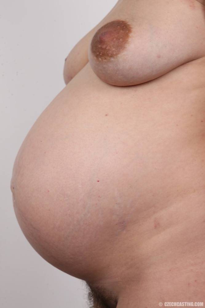 Likable brunette is pregnant and her belly shows that the birth is not far away. - #18