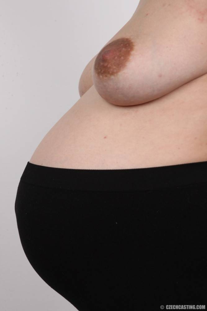 Likable brunette is pregnant and her belly shows that the birth is not far away. - #6