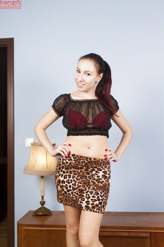 Shapely cutie Jenny Doreia in fancy skirt exposing tiny tits and bald pussy - #1