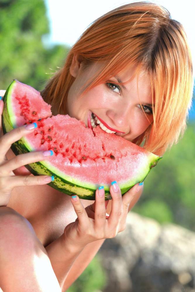 Redhead Babe Violla A Poses Nude Outdoors As She Is Chomping Down On A Watermelon - #5