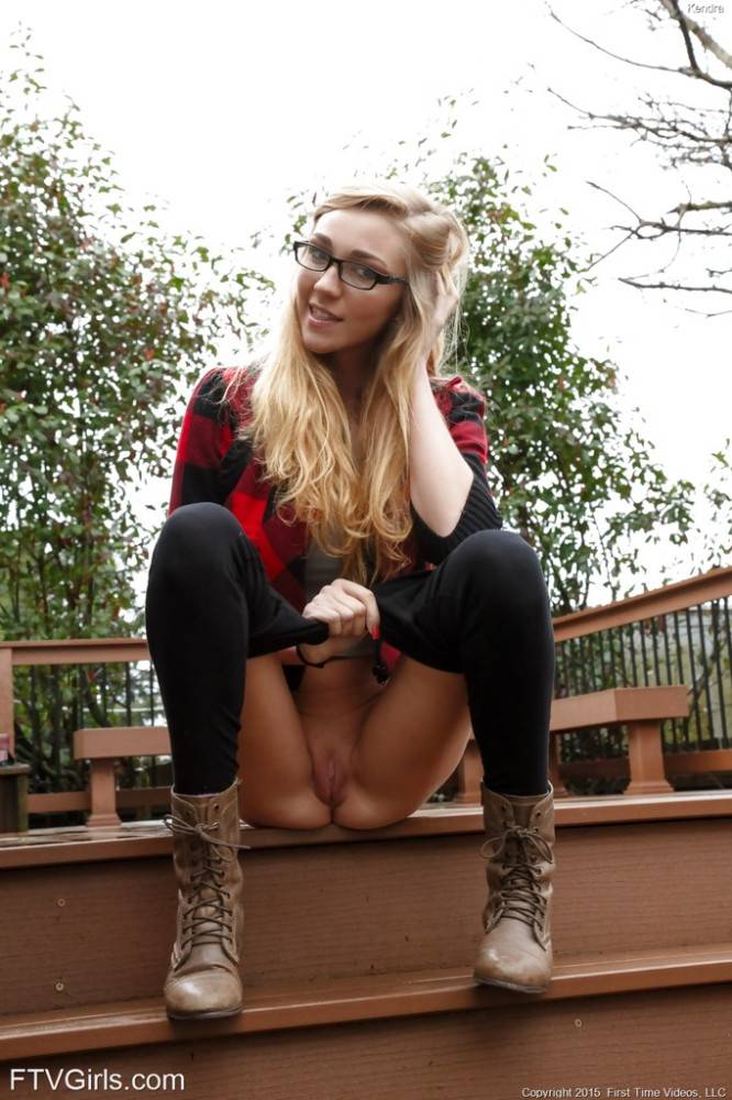 Foxy blond young Kendra Sunderland in glasses revealing big boobs and spreading her legs outdoor - #8