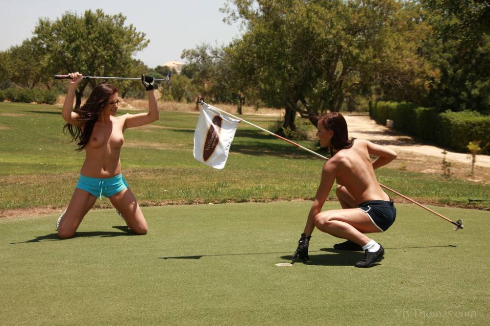Nude models playing golf nude - #4