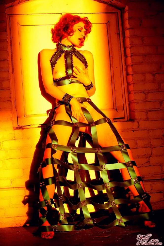 Redhead Justine Joli In Amazing Dress Made Of Leather Belts Poses In The Empty Room - #12