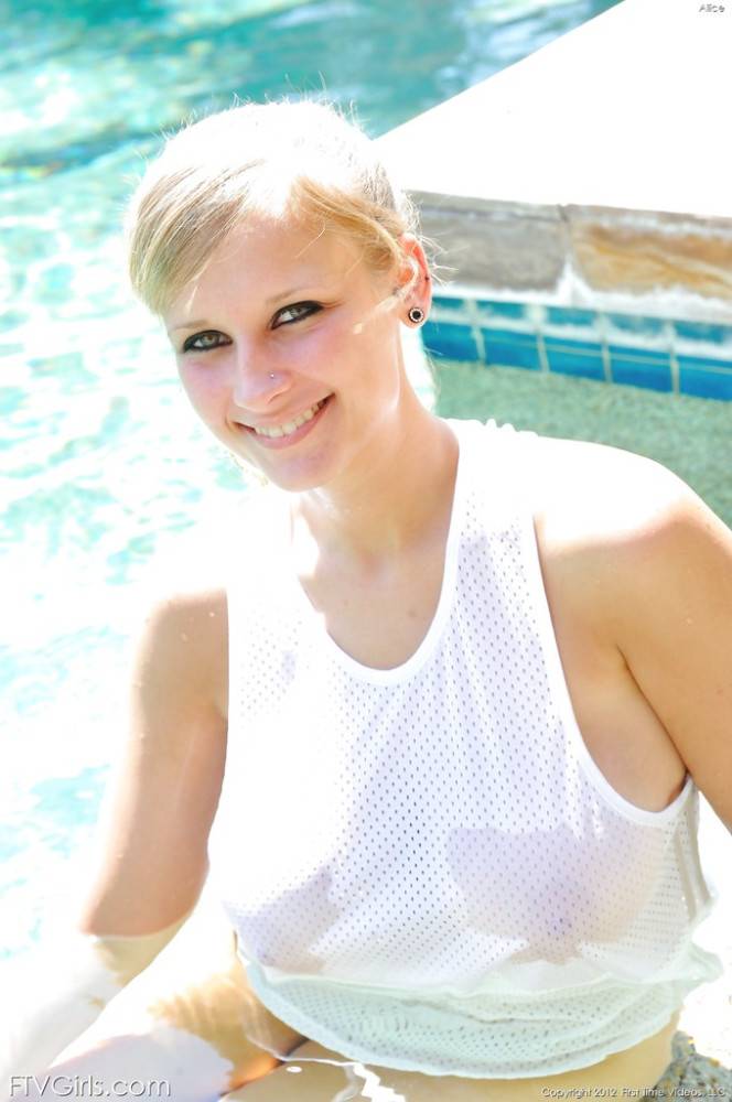 Enchanting american blond hottie Alice Wonder in panties exhibiting big tits and spreading her legs near the pool - #10