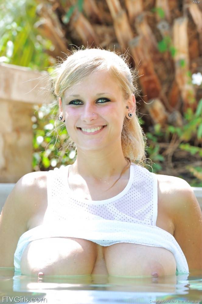 Enchanting american blond hottie Alice Wonder in panties exhibiting big tits and spreading her legs near the pool - #11
