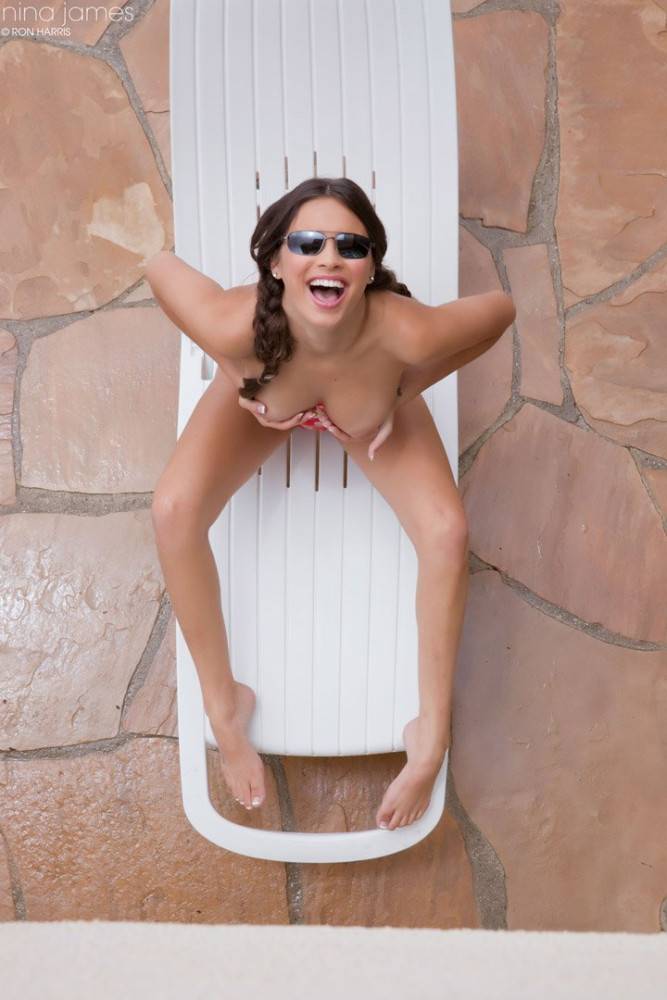 Topless Bimbo Nina James Gets Spied When Sun Tanning In Red Bikini Panty - #5