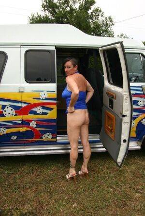 Mature amateur Mary Bitch gets naked inside a B-class van during solo action on nudepicso.com
