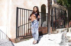 Amateur Asian teen babe Morgan Lee posing in denim jeans outdoors on nudepicso.com