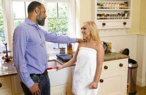 Blonde MILF Amber Deen seducing the chef and his big dick in the kitchen on nudepicso.com