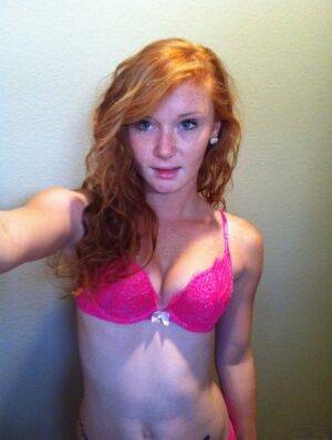 Natural redhead Alex Tanner slips off her pink lingerie set for nude selfies on nudepicso.com
