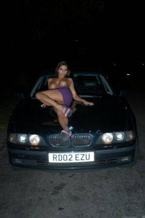 Long legged UK chick exposes her boobs on bonnet of car at night - Britain on nudepicso.com