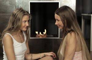 Teen lesbians Taylor Sands & Tiffany Tatum 69 on a rug in front of a fireplace on nudepicso.com