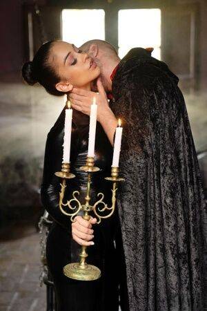 Hot girl Ginebra Bellucci is banged in crotchless leather wear by candlelight on nudepicso.com