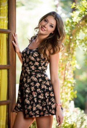 Beautiful solo model Elena Koshka shows her small tits outdoors on nudepicso.com