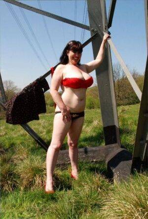 UK amateur Juicey Janey gets naked in heels underneath a hydro tower - Britain on nudepicso.com