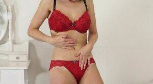 Amateur model Kacie Lames lets her big saggy tits free as she changes lingerie on nudepicso.com