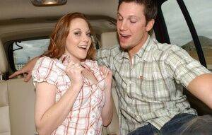 Redhead cutie Scarlett Fay reveals her tits and gives a blowjob in the car on nudepicso.com