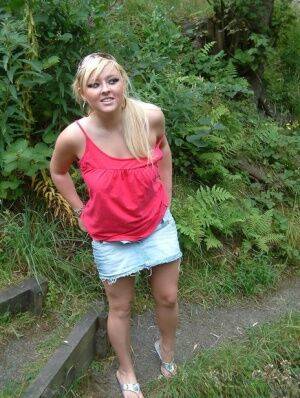 Overweight UK female with blonde hair strips naked on a popular walking trails - Britain on nudepicso.com