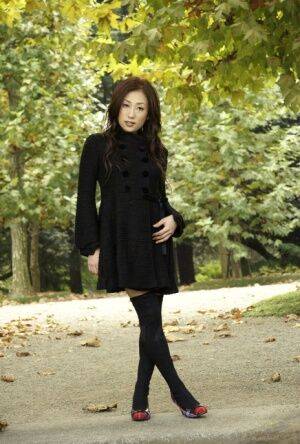 Fully clothed Japanese teen models in the park in black clothes and stockings - Japan on nudepicso.com