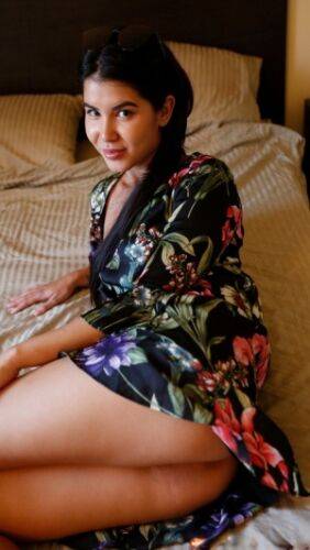 Asian amateur Lady Dee removes her floral print dress before having sex on nudepicso.com