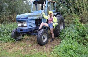 Mature amateur Barby Slut exposes herself on heavy equipment at a job site on nudepicso.com