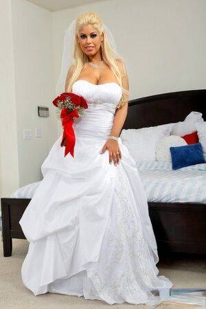 Busty blonde bride Bridgette B bangs another man on her wedding day on nudepicso.com