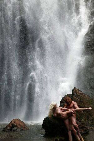 Stunning milf Jesse Jane fucks outdoor in the waterfall on cam on nudepicso.com