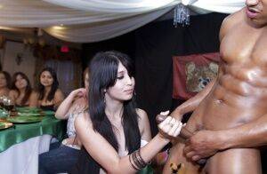 Interracial party with a hot muscular stripper and wild chicks on nudepicso.com