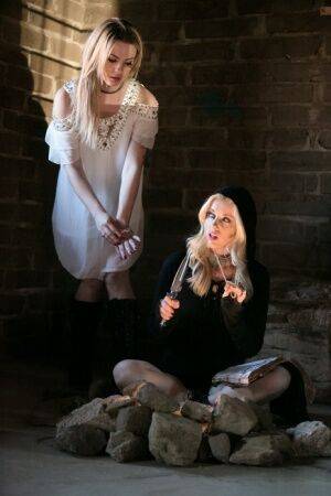 Fully clothed teens Dahlia Sky and Charlotte Stokely model in cosplay garb on nudepicso.com
