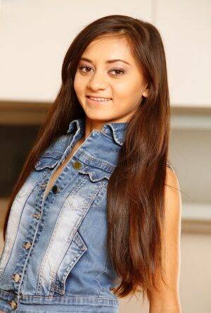 Cute teen Shrima Malati removes denim apparel before fingering her tight slit on nudepicso.com