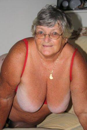 Morbidly obese nan Grandma Libby licks a nipple before spreading her cunt on nudepicso.com