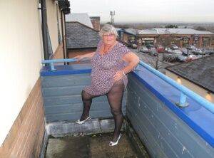 Fat UK nan Grandma Libby bares her tits on a balcony before getting butt naked - Britain on nudepicso.com