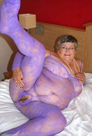 British fatty Grandma Libby masturbates on a bed in a crotchless bodystocking - Britain on nudepicso.com