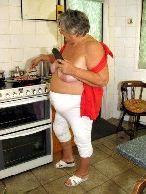 Obese female Grandma Libby masturbates with vegetables after cooking on nudepicso.com