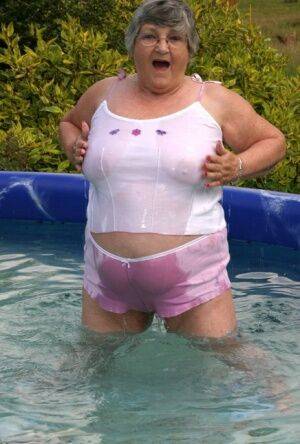 Overweight UK nan Grandma Libby exposes her boobs in a backyard swimming pool - Britain on nudepicso.com