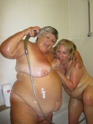 Grandma Libby and her lesbian lover wash each other during a shower on nudepicso.com