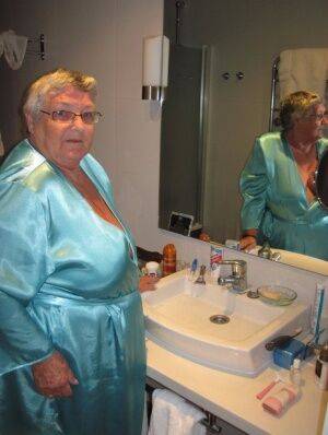 Morbidly obese woman Grandma Libby shaves before taking a bubble bath on nudepicso.com