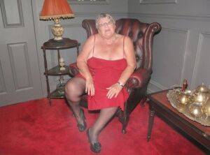 Obese grandmother Grandma Libby showcases her bald pussy in stockings on nudepicso.com