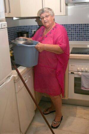 Fat UK nan Grandma Libby gets completely naked while cleaning her kitchen - Britain on nudepicso.com