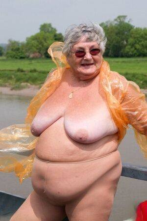 Obese British amateur Grandma Libby casts off a see-through raincoat - Britain on nudepicso.com