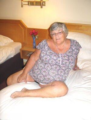 Silver haired British woman Grandma Libby exposes her fat body on a bed - Britain on nudepicso.com