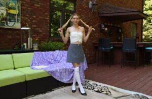 Teen amateur Jessica Marie masturbates while wearing white over the knee socks on nudepicso.com