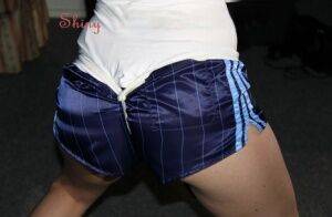 Sonja wearing a sexy oldschool blue shiny nylon shorts and a white top being on nudepicso.com