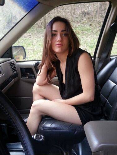 Horny girl Kasia Kelly takes selfies while playing with her pussy inside a car on nudepicso.com