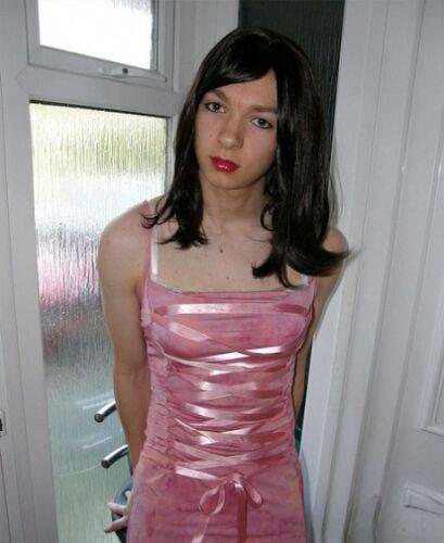 Petite TGirl showing off that slender body of hers in a pink dress on nudepicso.com