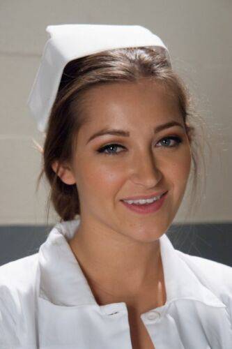 Gorgeous nurse with a nice butt Dani Daniels strips and poses in high heels on nudepicso.com