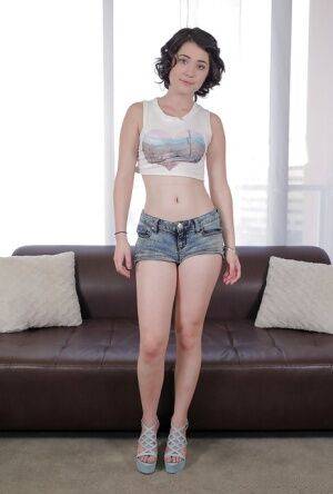 Amateur chick Cadence Carter posing in denim shorts for casting couch on nudepicso.com